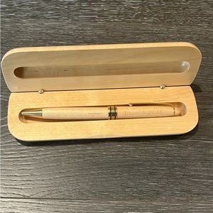 Wooden pen in wooden case